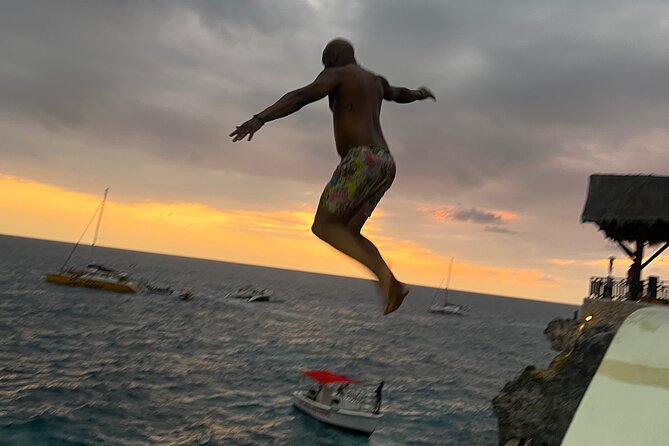 Negril Private Day Tour: ATV Ride, Party Catamaran & Ricks Cafe - Lively Party Catamaran Cruise