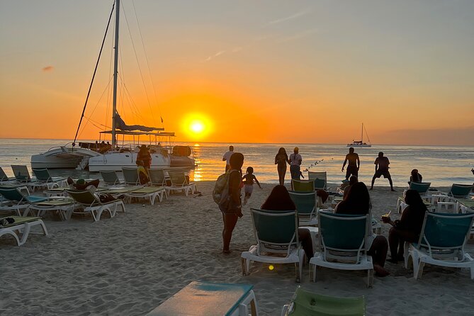 Negril Private Day Tour: ATV Ride, Party Catamaran & Ricks Cafe - Renowned Ricks Cafe Visit