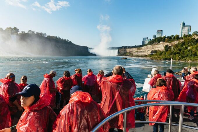 Niagara Falls, Canada: First Boat Cruise & Behind Falls Tour - Boat Cruise and Falls Access