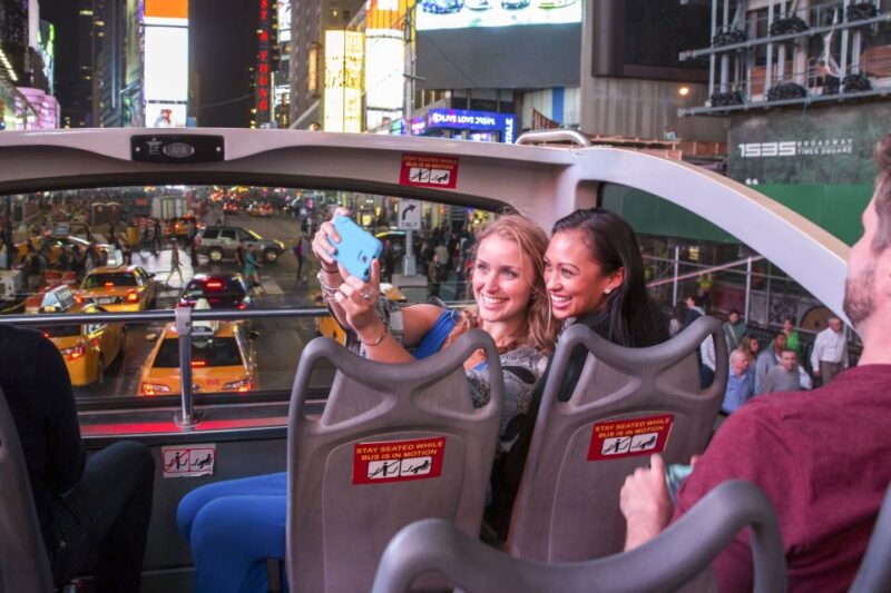 Nyc: Sightseeing Night Tour by Open-Top Bus With Live Guide - Key Points