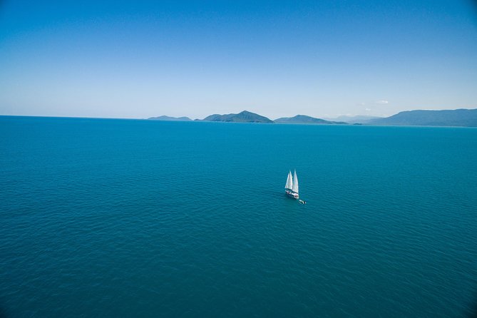 Ocean Free Green Island and Great Barrier Reef Snorkel Cruise - Onboard Amenities and Services
