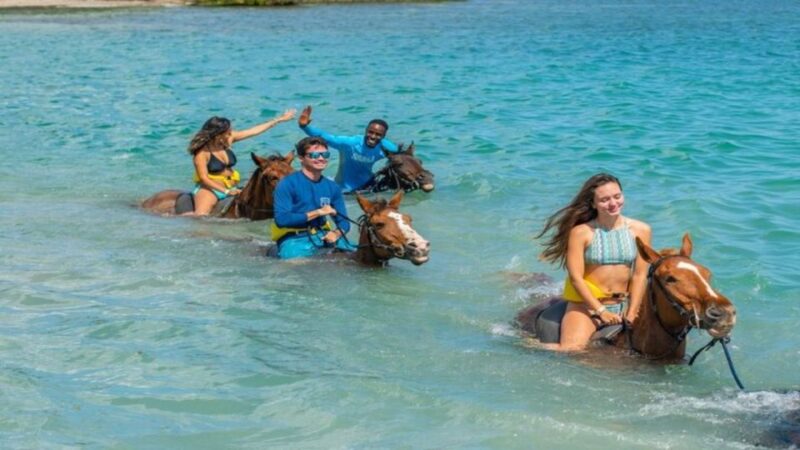 Ocho Rio: Dunns River Falls, Rafting, Horses & Ziplines Tour - Bamboo Rafting Journey
