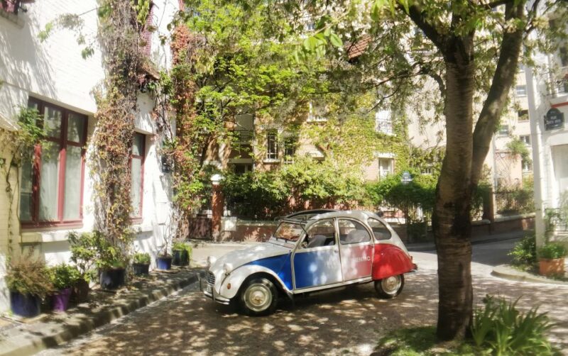 Off-the-Beaten Track in Paris: 2-Hour Vintage 2CV Tour - Transport and Guide Included