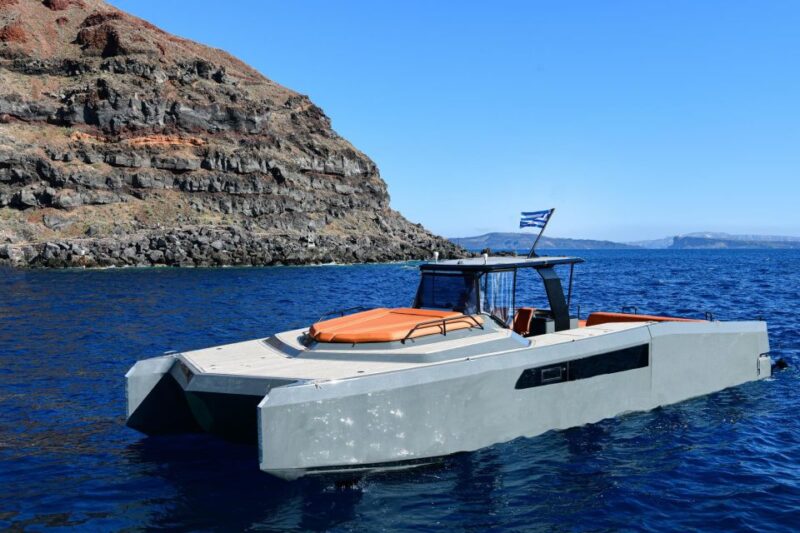 Oia: Private Santorini Catamaran Tour for Two With Drinks - Snorkeling and Water Activities