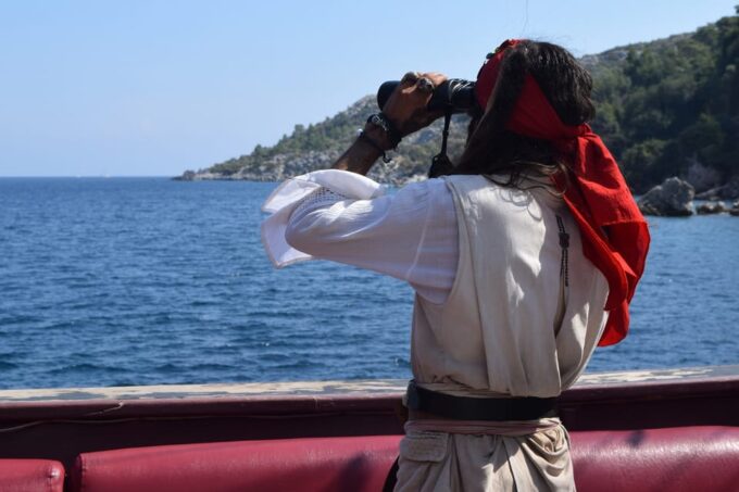 Ölüdeniz: Pirate Boat Cruise With Swim Stops and Lunch - Tour Guide Features