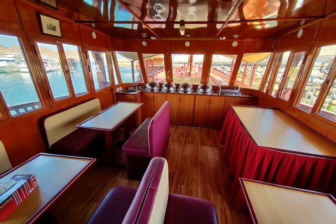 Omani Traditional Dhow Cruise: Sunset and Muscat Coastal View - Activity Description