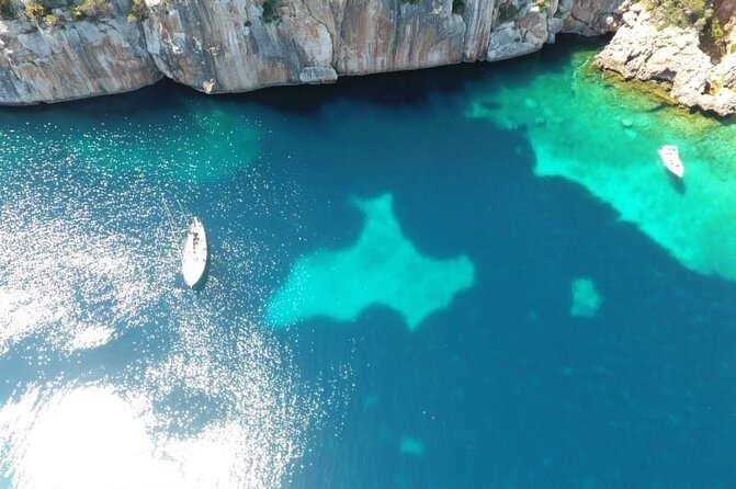 One Day Excursion on a Sailing Boat in the Gulf of Alghero - Inclusions and Amenities