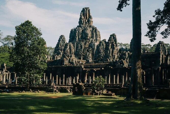 One Full Day Private Tour of Angkor Wat, Ta Prohm, Angkor Thom & Banteay Srie - Discovering Ta Prohm