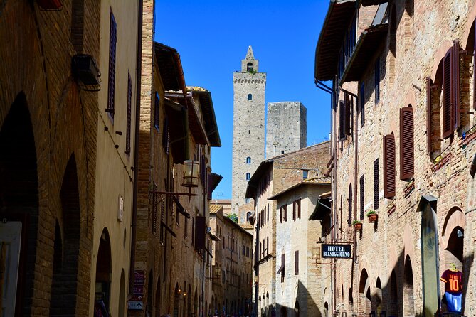 One Way Private Transfer: Florence to Rome With Visit to San Gimignano and Siena - Key Points