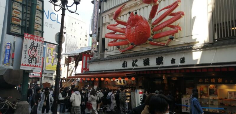 Osaka: Five Must-See Highlights Walking Tour & Ramen Lunch - Exploring the Vibrant Dotonbori