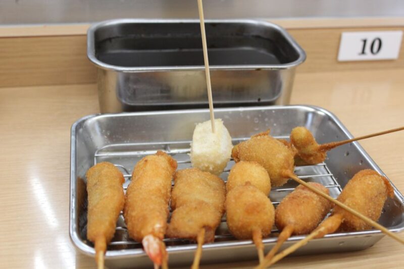 Osaka: Food Tour at Night With Tastings - Discovering Dotonburis Lights and Sounds