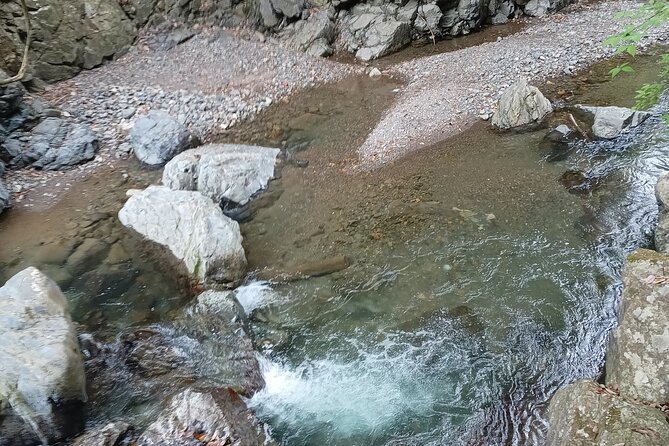 Osaka River Rapids Hike and Natural Hot Spring Tour - Key Points