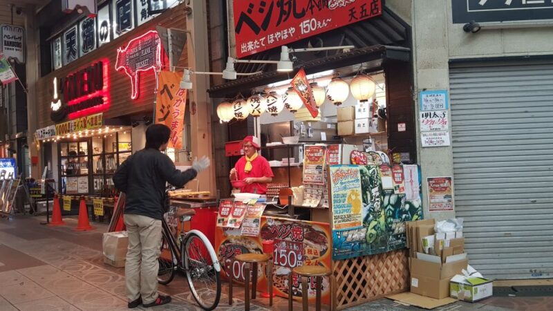 Osaka: Tenma and Kyobashi Night Bites Foodie Walking Tour - Transitioning to Kyobashi