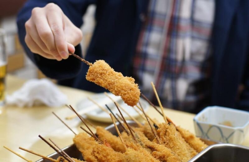 Osaka: Traditional Japanese Food Walking Tour With Guide - Key Points