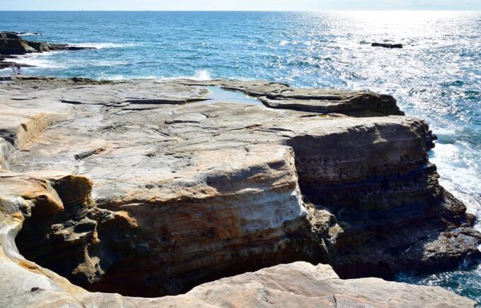 Osaka: Wakayama, Kishi Station, Shirahama and Coast Day Tour - Shirahama Onsen: Relaxing Therapeutic Waters