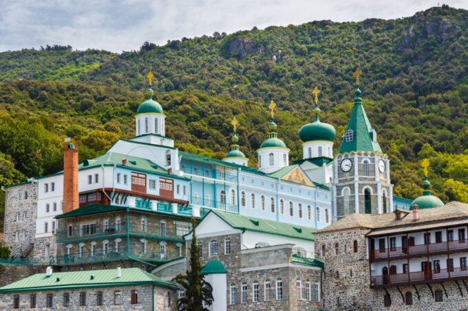 Ouranoupoli: Mount Athos Sightseeing Glass-Bottom Boat Tour - Onboard Amenities and Entertainment