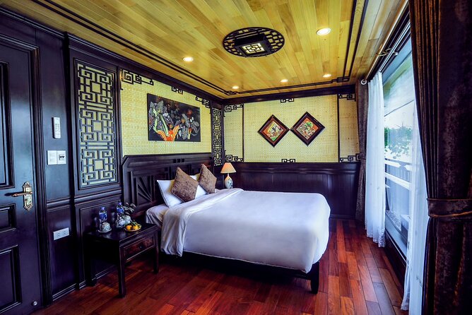 Overnight Halong Bay Cruise Including Transfer Service and Kayaking or Bamboo Boat Activities - Overview of the Cruise Experience