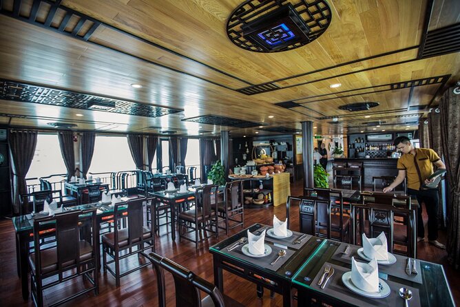Overnight Halong Bay Cruise Including Transfer Service and Kayaking or Bamboo Boat Activities - Cancellation Policy
