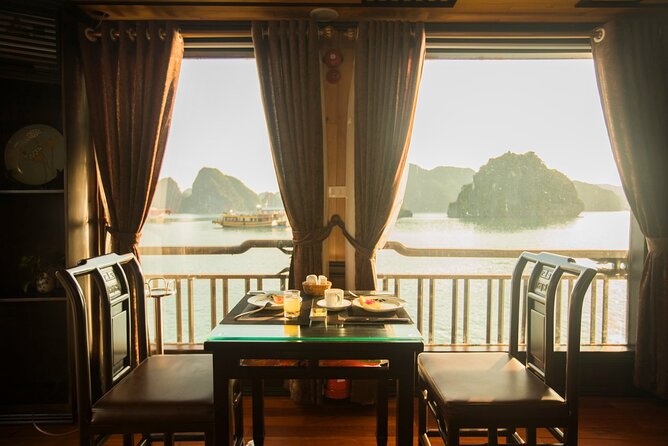 Overnight Halong Bay Cruise Including Transfer Service and Kayaking or Bamboo Boat Activities - Onboard Activities and Amenities