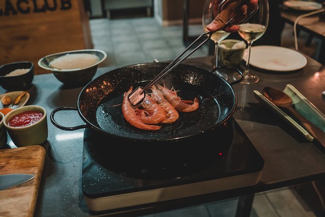 Paella Experience and Bottomless Wine in Barcelona - Purchasing Paella Kits for Home