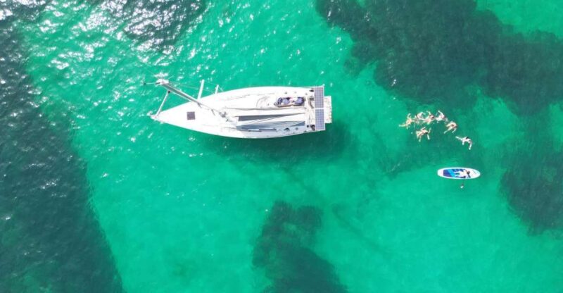Palma Bay: Sailing Boat Tour With Mallorcan Tapas & Drinks - Sailing Experience