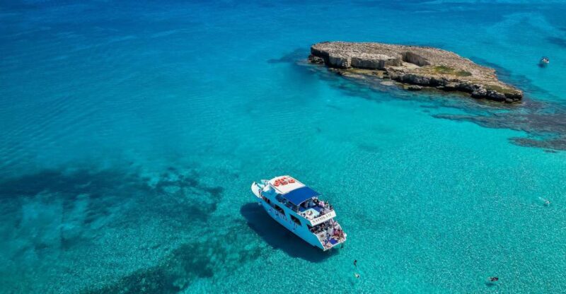 Paphos/Akamas: Blue Lagoon Bus & Boat Tour With Water Slide - Itinerary and Highlights