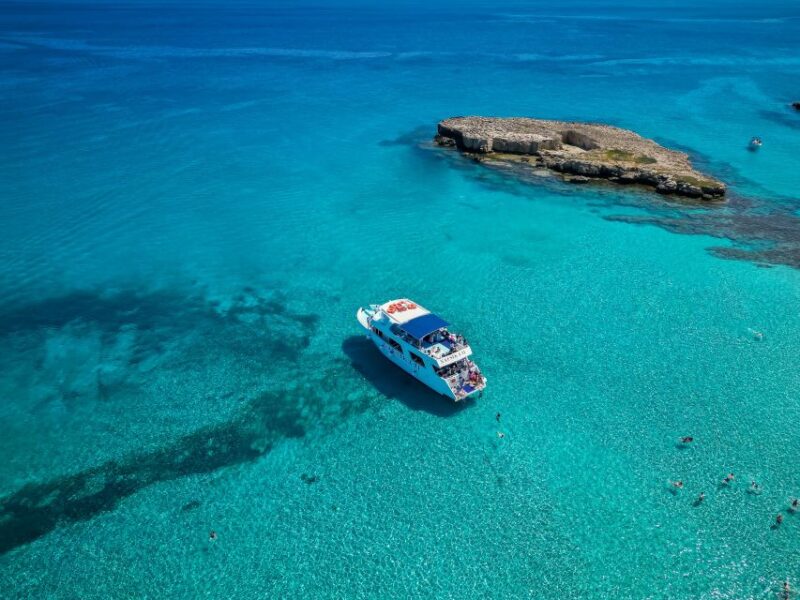 Paphos/Akamas: Blue Lagoon Bus & Boat Tour With Water Slide - Experience and Guide