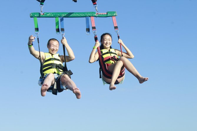 Parasail With Transportation Over Cancun Bay - Dock Fee and Additional Costs
