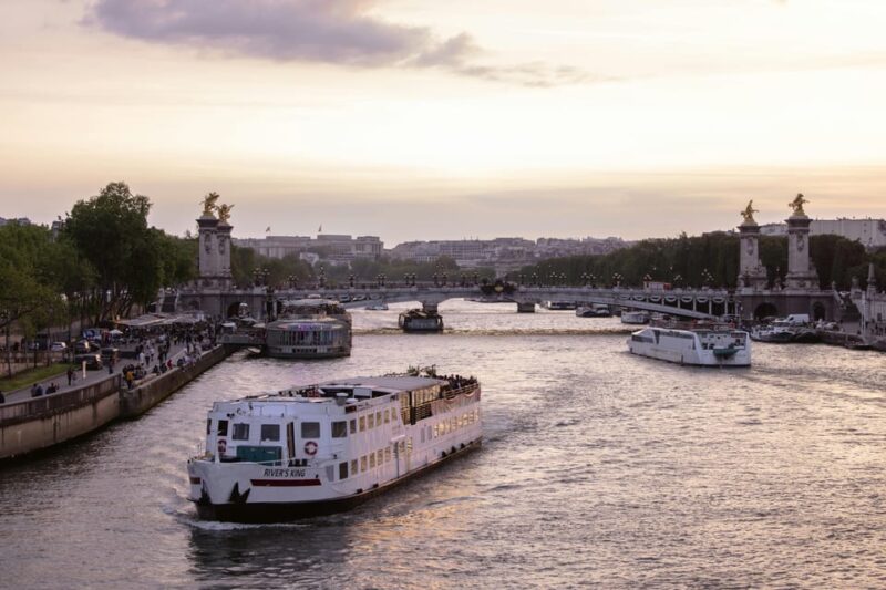 Paris: City of Lights Walking Tour and Seine River Cruise - Key Attractions and Experiences