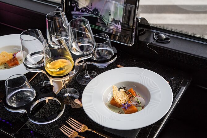 Paris Dinner Bus Toque With Champagne From Champs-Elysees - Scenic Tour Through Paris Landmarks