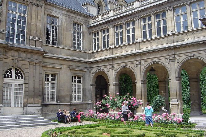 Paris Le Marais Historical Walking Tour With Wine and Cheese Tasting - Historical Influences in Le Marais