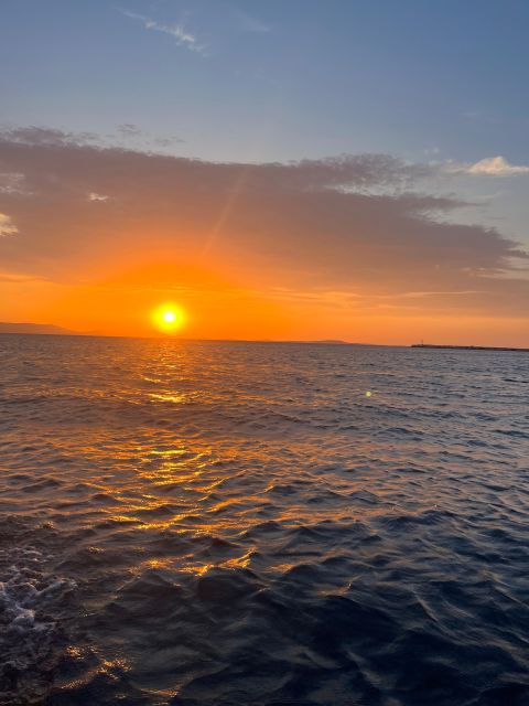 Paros: Sunset Boat Tour to Antiparos With Wine - Itinerary