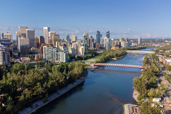 Pedal the Picturesque: Private Calgary & Bow River Bike Tour - Riding Along the Bow River