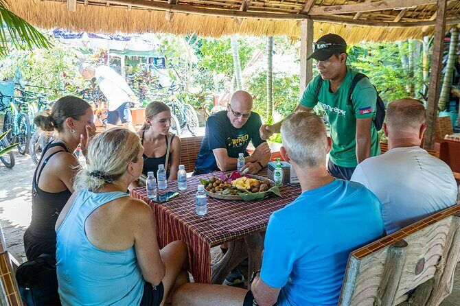 Phnom Penh to Silk Island Sunset Bike Tour/ E-Bike or Tuk Tuk - Sunset and Riverside Snacks: The Perfect End