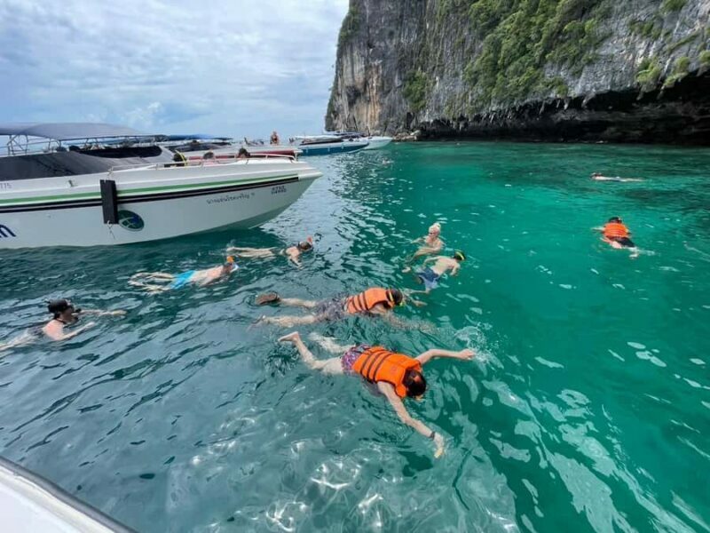 Phuket: Full Day Early Bird to Phi Phi Island & German Guide - Key Points