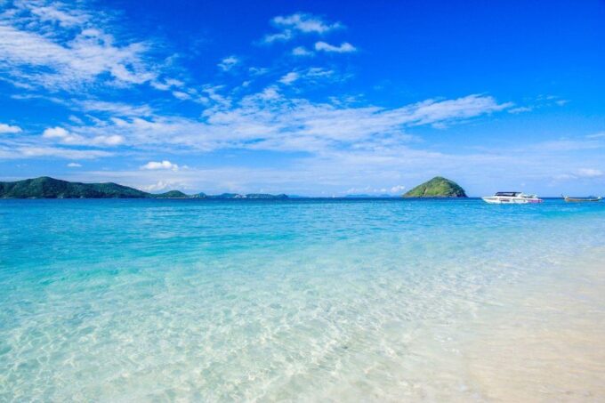 Phuket: Full-Day to Kahung Beach (Coral Island) by Speedboat - Languages and Cancellation Policy