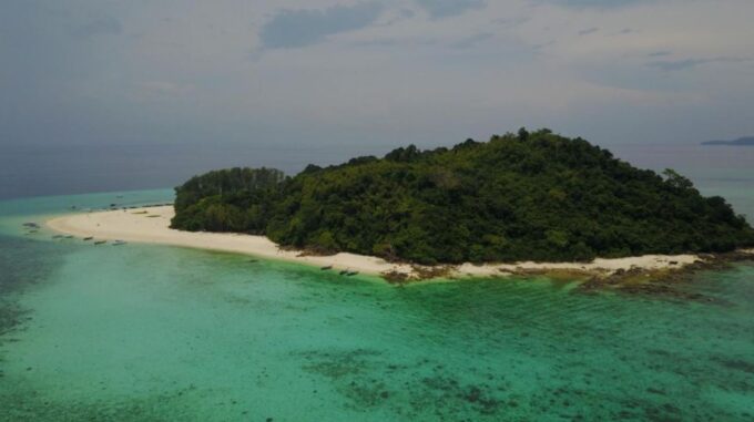 Phuket: Phi Phi Sunrise Boat Tour to Bamboo and Khai Island - Exploring Phi Phi Islands