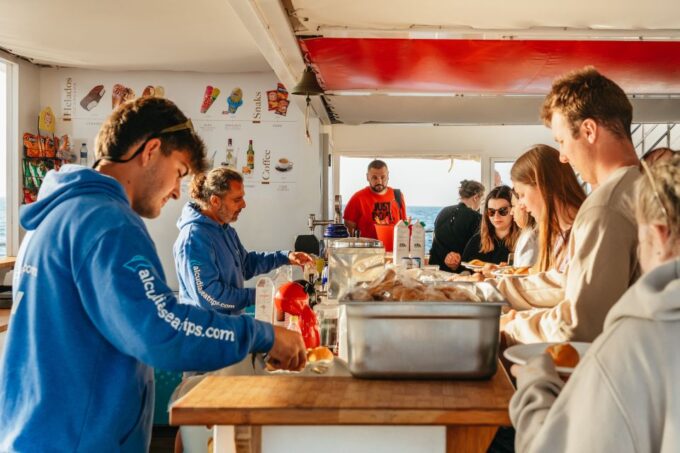 Port Dalcudia: Sunrise at Sea & Dolphin Watching Boat Tour - Departure Time and Duration