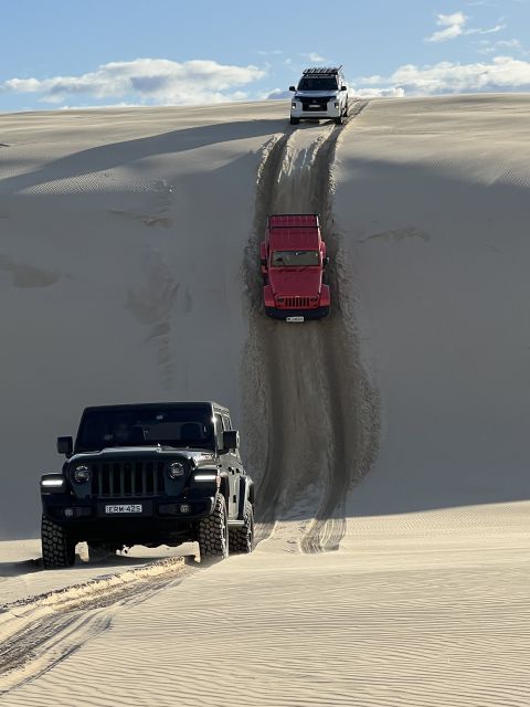 Port Stephens: Stockton Sand Dunes 4WD Tag-Along Tour - Sandboarding the Stockton Sand Dunes
