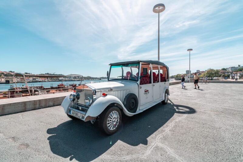 Porto: City Center Eco Car Tour River - Key Points