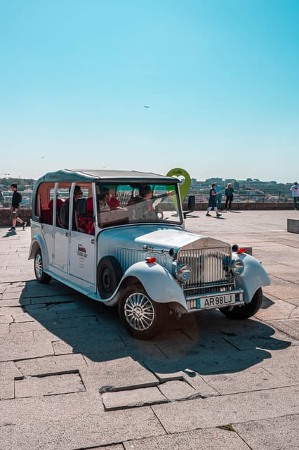 Porto: City Center Eco Car Tour River - Tour Highlights