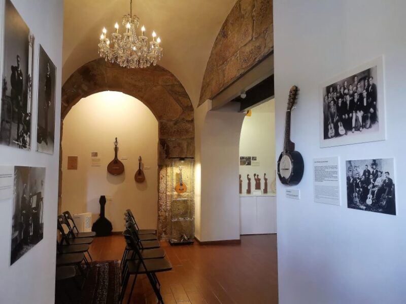 Porto: Fado Concert With Port Wine in Historical Music Store - Key Points