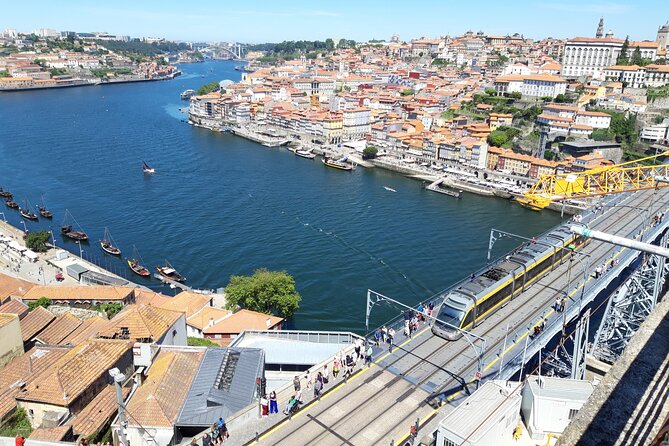 Porto Private Airport Transfer With 2-Hour Mini-Tour (1 to 4 People) - Booking Confirmation and Flexibility