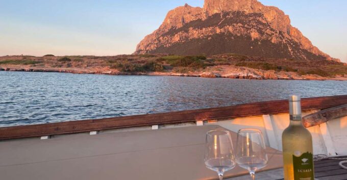 Porto San Paolo: Vintage Cruise Sunset Aperitif to Tavolara - Check-in Requirement