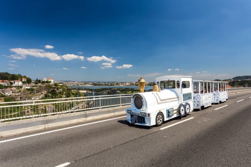 Porto: Wine Cellar Entry, Train Tour & Optional River Cruise - Wine Tastings and Cellar Tour