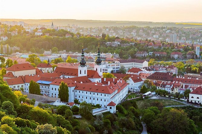 Prague Private City Walking Tour With Transit by Car - Scenic Sights Along the River