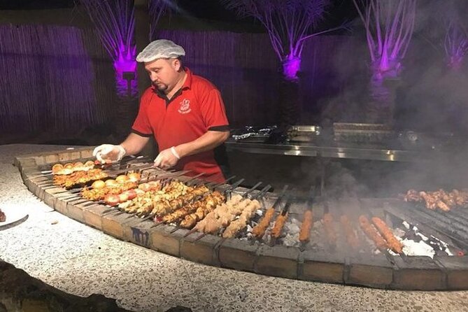 Premium Desert Safari With BBQ Dinner & Belly Dance - Sandboarding and Camel Riding