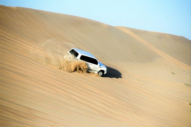 Premium Full-Day Safari, Dune Bash, Camel Ride and BBQ Meal in Desert Camp - Camel Riding and Dune Bashing