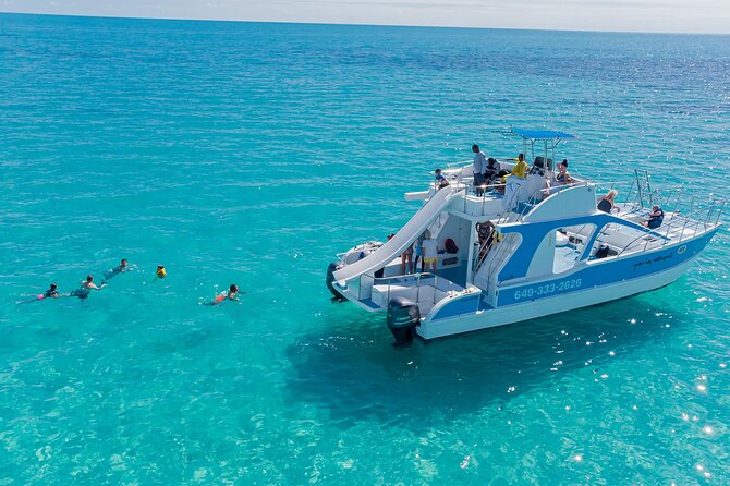 Private 7-Hour Catamaran Tour in Turks and Caicos - Relaxing on the Catamaran