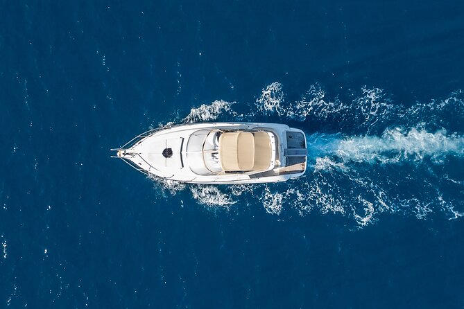 Private All Included Yacht Tour in Santorini - Indulging in Local Cuisine and Relaxation